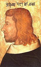 profile of a bearded man with long red hair