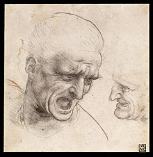 Two male heads in pencil, one close-up, the other miniature.