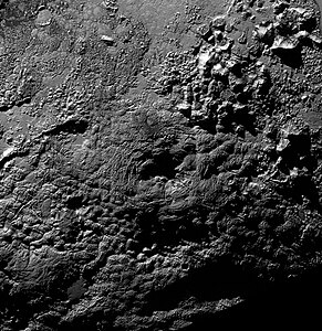 Wright Mons, a cryovolcano on Pluto