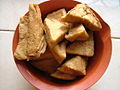 Tahu goreng (fried tofu) has its brown skin.