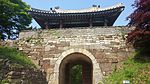 Korean-style fortress gate in the stone walls
