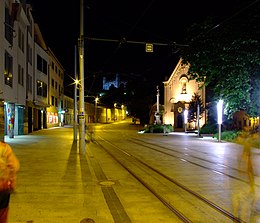 Street with tram tracks at night