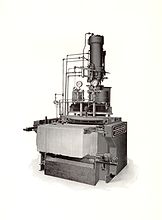 A hydraulic press with an automatic spreader by the Consolidated Macaroni Machine Corporation, Brooklyn, New York. This machine was the first to spread long cut alimentary paste products onto a drying stick.