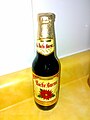 Noche Buena beer, showing the Noche Buena (Poinsettia) and a volume of 355 ml (12.0 U.S. fl oz; 12.5 imp fl oz) on the label.