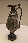 A ewer with Greco-Roman scenes from the tomb of Northern Zhou general Li Xian.[4][1] It was probably made in Bactria.[21]