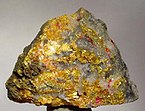 Orpiment and realgar on a vuggy, quartz matrix, Nishinomaki Mine, Gunma Prefecture, Japan