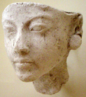 Plaster portrait study thought to represent Queen Nefertiti, primary wife of the pharaoh Akhenaten, discovered within the workshop of the royal sculptor Thutmose at Amarna, now part of the Egyptian Museum of Berlin