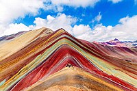 Vinicunca the "Mountain of seven colors" in the Andes of Peru. Revealed in the mid-2010s by glacier caps melting due to climate change.