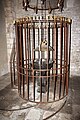 Cage protecting a baptismal font