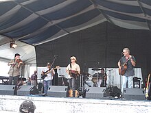 Steve Riley and the Mamou Playboys perform at the New Orleans Jazz & Heritage Festival, April 2009.