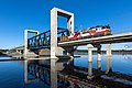 Image 38A Sr1-pulled lumber train crossing the drawbridge along the Savonia railway in Kuopio, Finland (from Rail transport)