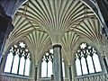 The chapter house is off the staircase to the right. Its central column and vault are often likened to a palm tree.