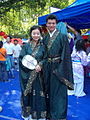 A woman wearing qujupao and a man wearing a zhiqupao, Chinese Cultural Festival in Guangzhou, 2008.
