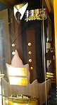 Britannia Yacht Club display cabinet in Commodore's boardroom features Thomas G. Fuller's uniform, sword and a memorial trophy awarded annually to the Canadian Forces Naval Reserve achieving the topmost state of combat readiness