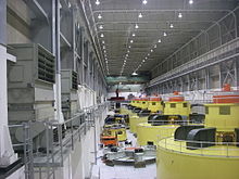 The inside of the Glen Canyon power plant, showing a row of large hydro-electric generators