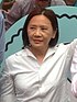 Deanie Ip in 2016 looking to the left, wearing a white blouse