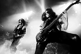 Former members Abbath (left) and Apollyon performing at Hole in the Sky festival in 2011