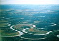 Image 24The Nowitna River in Alaska. Two oxbow lakes – a short one at the bottom of the picture and a longer, more curved one at the middle-right. (from Lake)