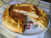 Pirog with quark and beet greens filling