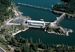 An aerial view of a large river and dam