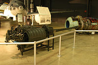 German BK 5 50 mm aircraft autocannon displayed in front of the Me 262A jet, a design once tested with it