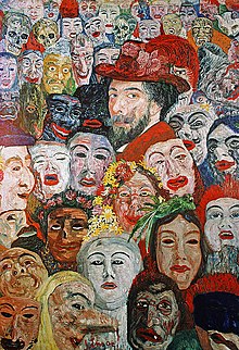 Porträt im Viertelprofil eines Mannes mit einem gezwirbelten Schnurr-, Kinnbart und rotem Blumenhut. Sein Kopf ist umgeben von zahlreichen Masken unterschiedlichster Kulturen, die die Aufmerksamkeit von dem Porträt abziehen.
