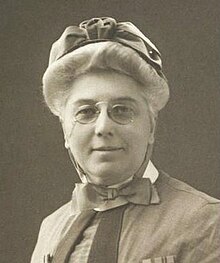 Early 20th-century woman in matron's cape