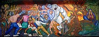 A mural depicts multiple people claiming and other fighting humanoid creatures. Some people hold books and documents that translate as "Social justice", "1917 Constitution" and the Spanish acronyms for the "Food and Agriculture Organization", the "Organization of American States", and the "United Nations".