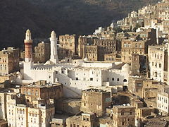 View of the mosque, nestled in the buildings of Jibla and slopes of the Sarat Mountains, as seen from the palace
