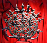 A sun disk found in tombs in Alacahöyük dates back to the early Bronze Age. Notice the three sun crosses on the sun disk.