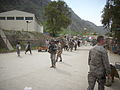 Combined Joint Task Force 82nd Soldiers and logistics units walk the Torkham border crossing area with CENTCOM Deployment and Distribution Operations Center Director, U.S. Air Force Maj. Gen. Robert McMahon, March 25, 2010, Torkham, Afghanistan.