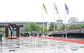 Order of precedence at the state visit of Greek prime minister Antonis Samaras in Berlin (24 August 2012): The Greek flag takes the first order of precedence, followed by the German flag on the right (seen on the left when facing the building) and the European flag in third order, on the left.