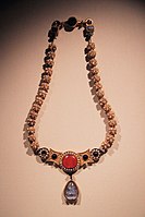Necklace from the tomb, imported from South Asia.[10] National Museum of China.[11][12]