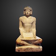 A 42, another seated 5th Dynasty scribe on display at the Louvre