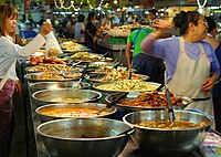 Food stall in Chiang Mai, Thailand selling ready-cooked food.