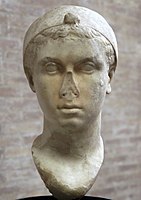 Cleopatra, mid-1st century BC, with a "melon" hairstyle and Hellenistic royal diadem worn over her head, now in the Vatican Museums[1][3][420]