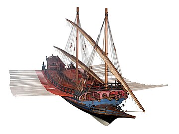 Model of a large galley with a blue hull and red decking