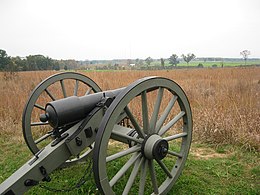 Photo shows a Civil War cannon with a band around the breech.