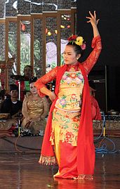 The Sundanese Jaipongan dance performance accompanied by a gamelan ensemble in West Java Pavilion, Taman Mini Indonesia Indah, Jakarta.