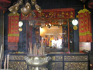 The temple's main altar to Guan Yin.