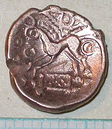 A dull bronze-coloured coin with a stylised picture of a horse