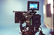 A photograph of the Red EPIC camera, with its output screen unfolded