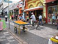 "Vendedor de pequi", fruit seller, a common sight in Brazil