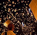 Sky lanterns in the sky on the night of Yi Peng in Thailand.
