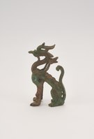 Zhou dynasty bronze sculpture of a dragon highlighted in The Macau Museum in Lisbon, Portugal