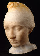Head of Camille Claudel, 1884, by Auguste Rodin, portrays sculptor Camille Claudel wearing a Phrygian cap.