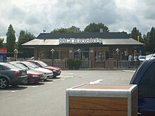 A refurbished stand-alone McDonalds in Portsmouth, England. Unlike international McDonald's, British McDonald's are simply being refurbished rather than rebuilt.