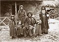 Georgian poet and writer Vazha-Pshavela (centre) wearing a Georgian papakha with his family