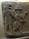 a depiction of kusarikku (right) from Carchemish