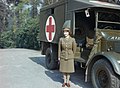 Princess Elizabeth in the Auxiliary Territorial Service (ATS) in front of an Austin K2/Y Ambulance, April 1945.[2][3]